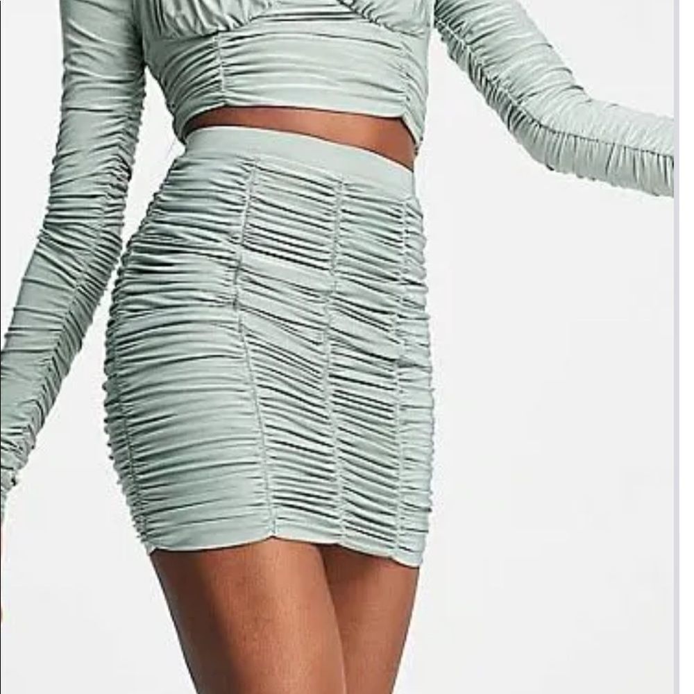 Club London Mini skirt sage. NWT. Size 6